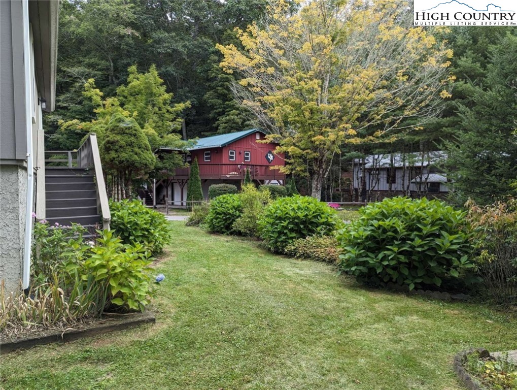 25 Meadow Loop Newland, NC 28657 - Photo 11 of 35 a view of a garden with plants