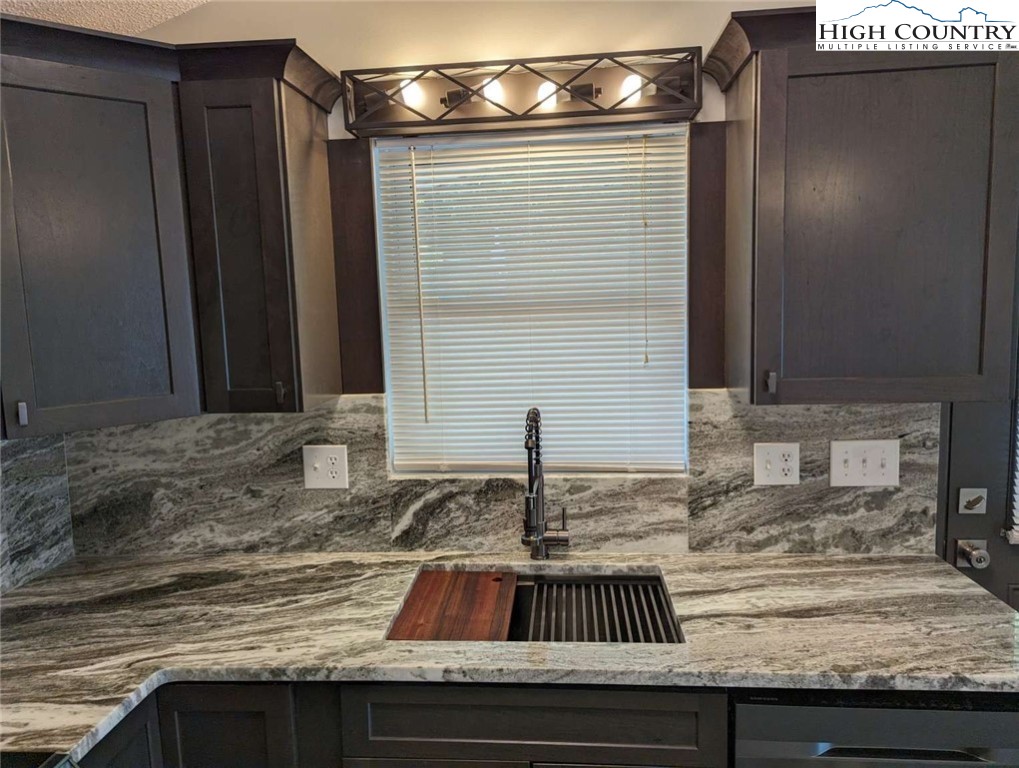 25 Meadow Loop Newland, NC 28657 - Photo 17 of 35 a kitchen with sink and refrigerator