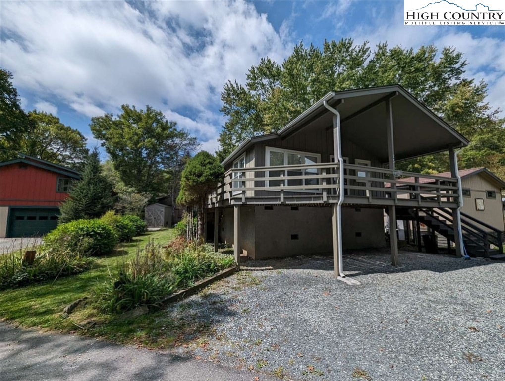 25 Meadow Loop Newland, NC 28657 - Photo 2 of 35 a view of a house with a yard and sitting area