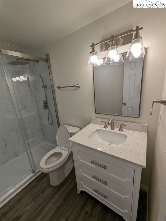 25 Meadow Loop Newland, NC 28657 - Photo 25 of 35 a bathroom with a toilet sink and mirror