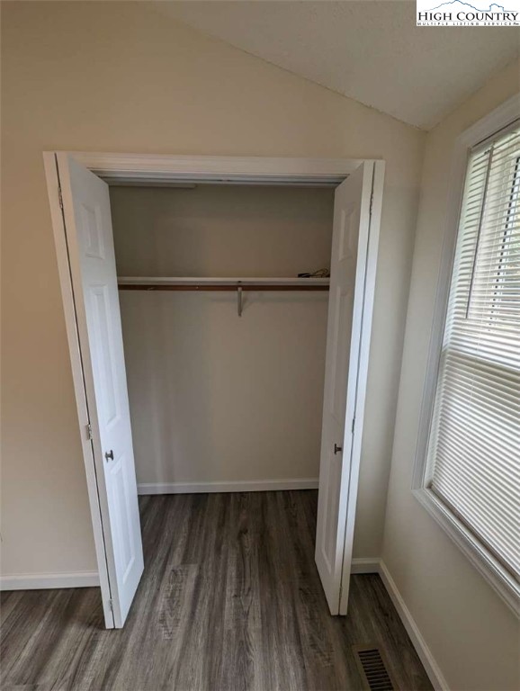 25 Meadow Loop Newland, NC 28657 - Photo 26 of 35 a view of closet with wooden floor and window