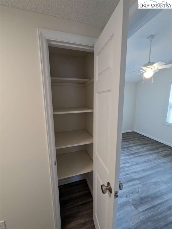 25 Meadow Loop Newland, NC 28657 - Photo 29 of 35 a view of a hallway with wooden floor and closet
