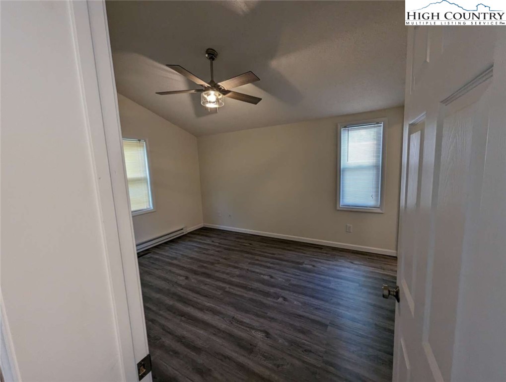 25 Meadow Loop Newland, NC 28657 - Photo 35 of 35 a view of an empty room with wooden floor and a window