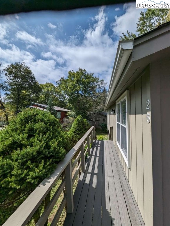 25 Meadow Loop Newland, NC 28657 - Photo 5 of 35 a balcony with wooden floor and outdoor space