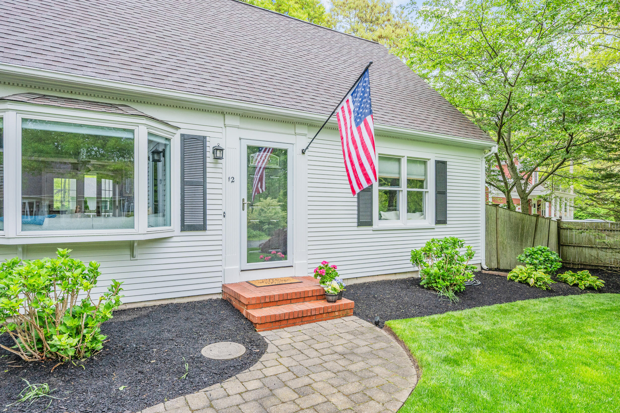 12 Anthony Drive Hyannis, MA 02601 - Photo 2 of 34 a front view of a house with garden