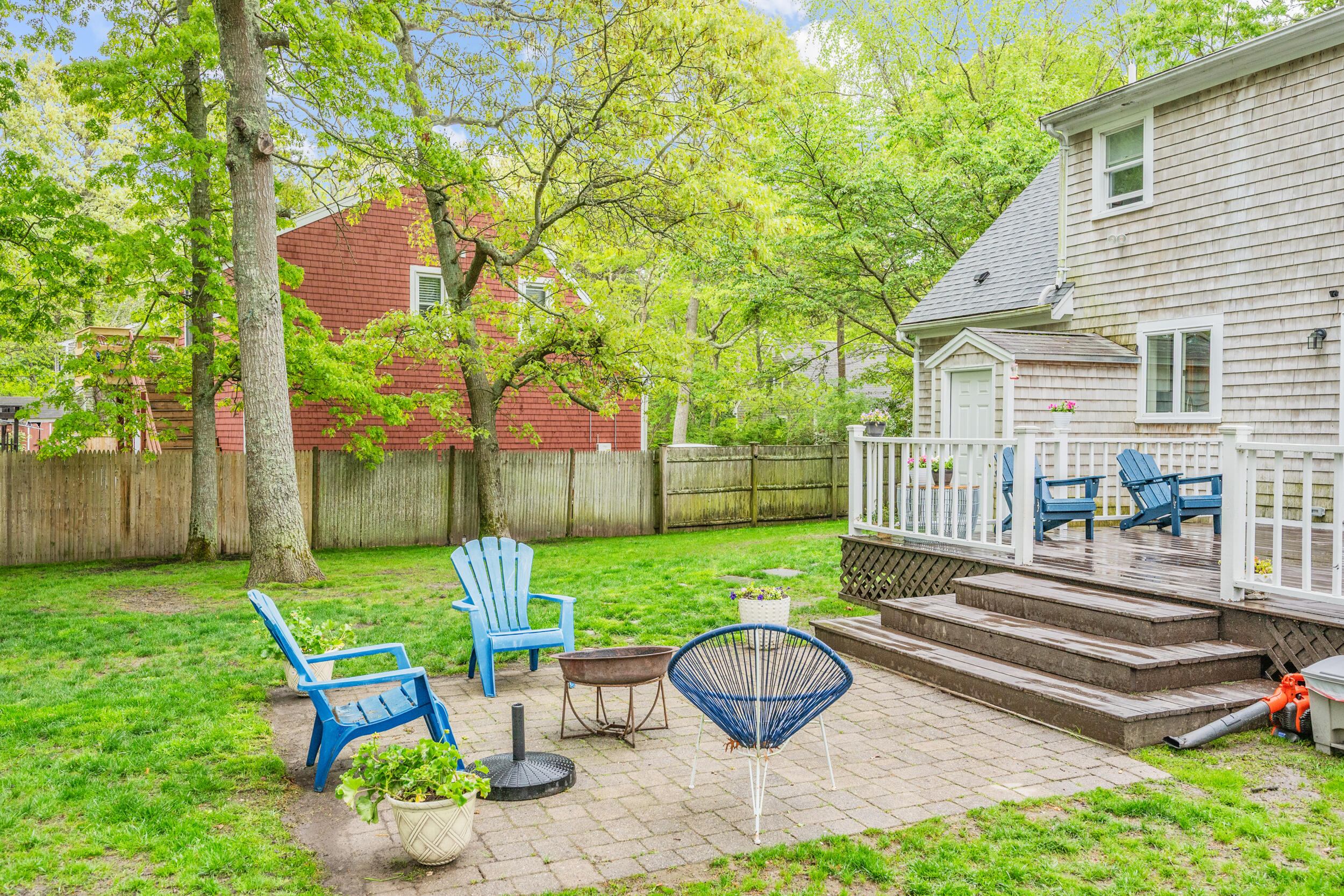 12 Anthony Drive Hyannis, MA 02601 - Photo 27 of 34 a view of a chair and table in backyard of the house