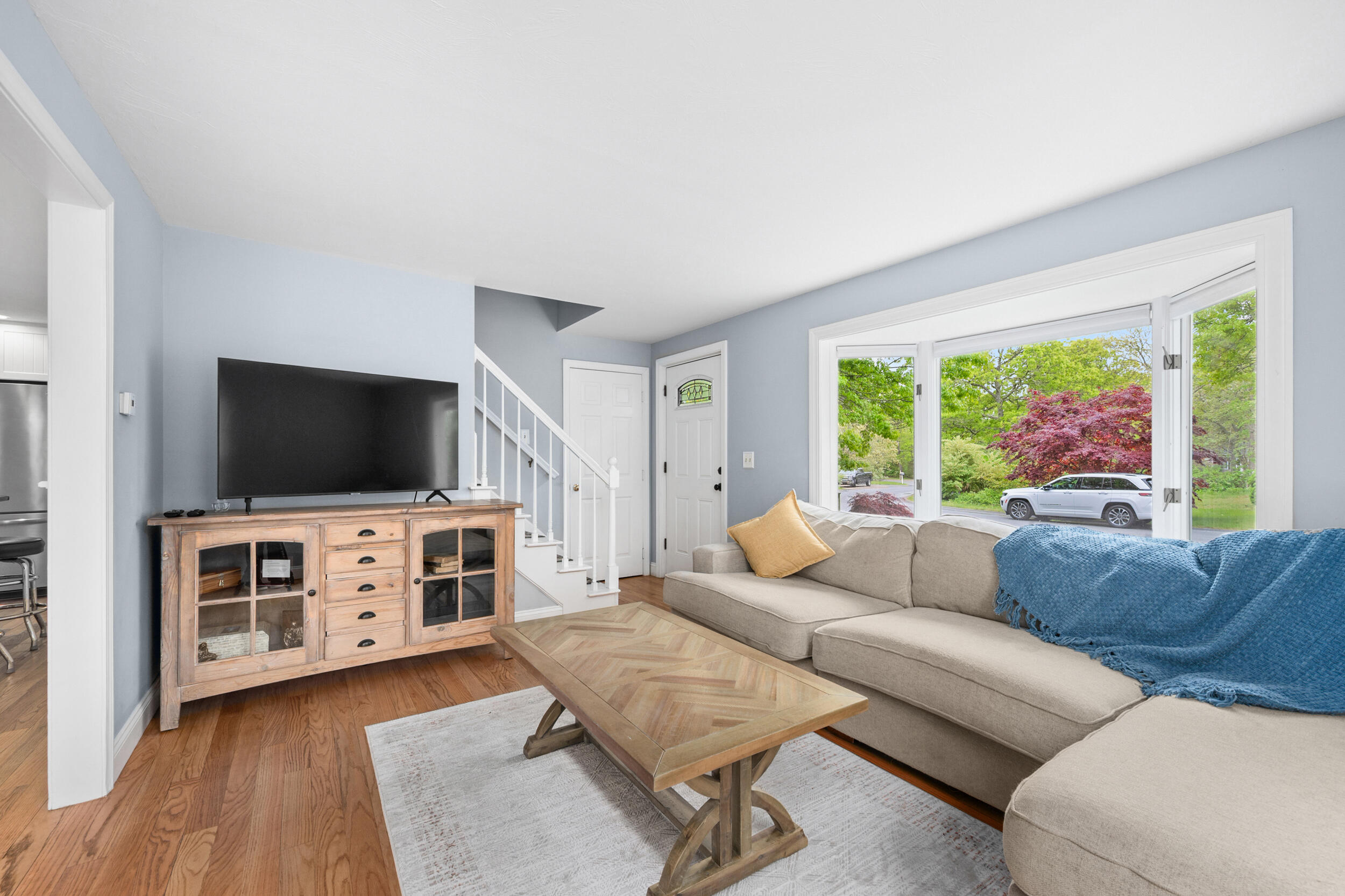 12 Anthony Drive Hyannis, MA 02601 - Photo 5 of 34 a living room with furniture and a flat screen tv