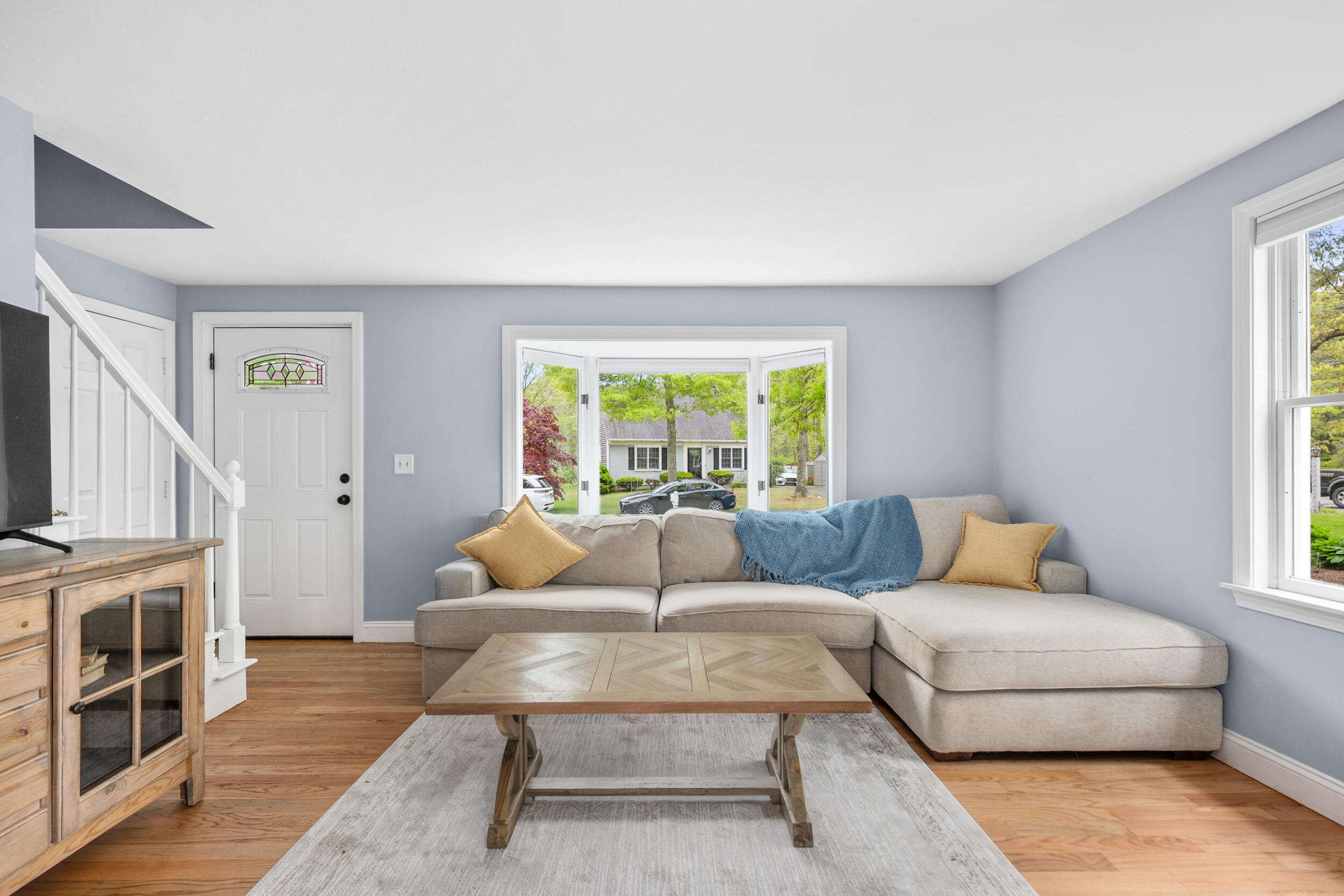 12 Anthony Drive Hyannis, MA 02601 - Photo 6 of 34 a living room with furniture and a flat screen tv