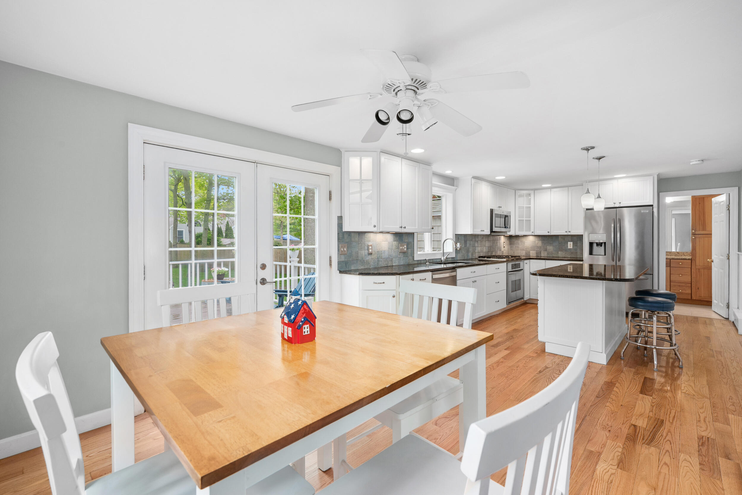 12 Anthony Drive Hyannis, MA 02601 - Photo 10 of 34 a view of a dining room with furniture and wooden floor