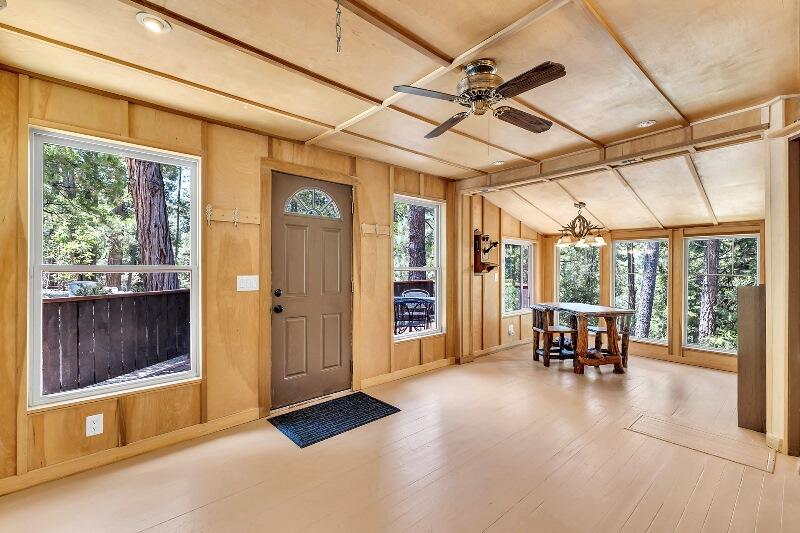 27240 Saunders Meadow Road Idyllwild, CA 92549 - Photo 13 of 51 a view of a livingroom with furniture window and outside view