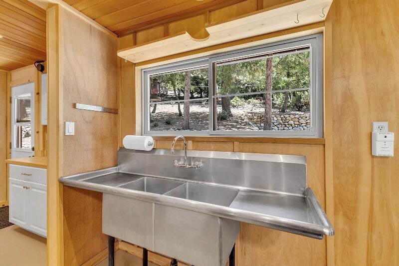 27240 Saunders Meadow Road Idyllwild, CA 92549 - Photo 24 of 51 a kitchen with a sink and a window