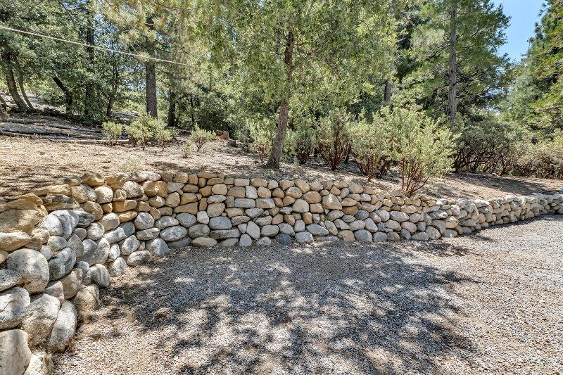 27240 Saunders Meadow Road Idyllwild, CA 92549 - Photo 3 of 51 a view of a road with a tree