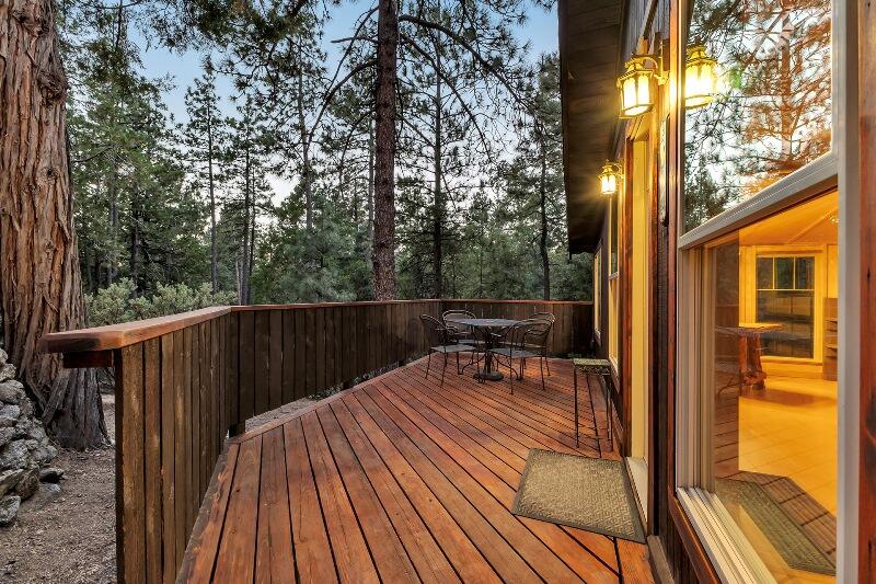 27240 Saunders Meadow Road Idyllwild, CA 92549 - Photo 48 of 51 a view of balcony with wooden floor and outdoor seating