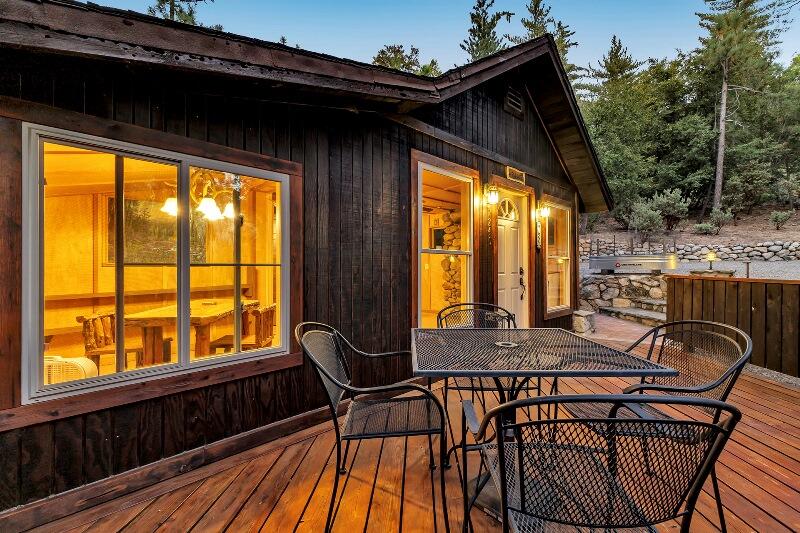 27240 Saunders Meadow Road Idyllwild, CA 92549 - Photo 49 of 51 a view of patio with table and chairs