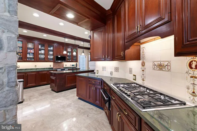 a bedroom with a bed and a fireplace