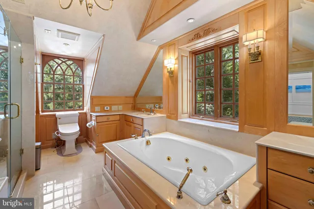 a front view of a house with a yard and fountain