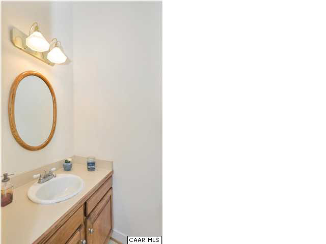 121 Vincennes Road Charlottesville, VA 22911 - Photo 13 of 42 a bathroom with a sink and a mirror