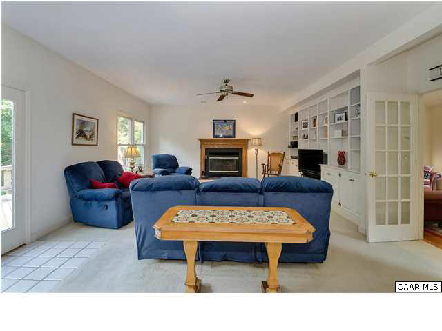 121 Vincennes Road Charlottesville, VA 22911 - Photo 15 of 42 a living room with furniture and a fireplace