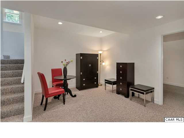 121 Vincennes Road Charlottesville, VA 22911 - Photo 28 of 42 a room with furniture and a chair