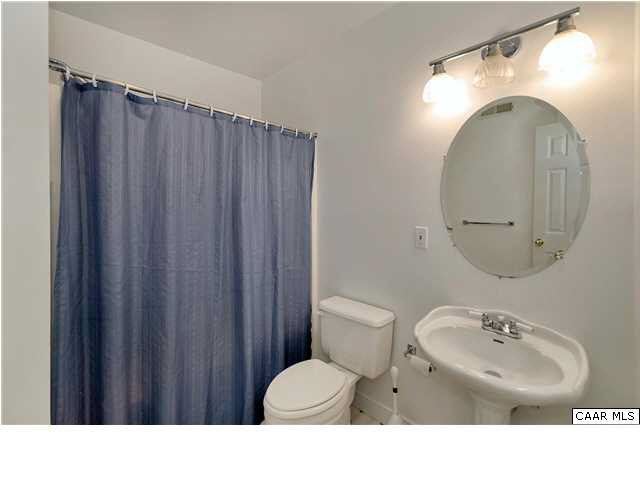 121 Vincennes Road Charlottesville, VA 22911 - Photo 31 of 42 a bathroom with a sink mirror and toilet
