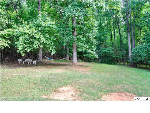 121 Vincennes Road Charlottesville, VA 22911 - Photo 35 of 42 a backyard of a house with yard and trampoline