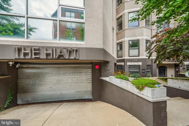 a front view of a building with glass windows