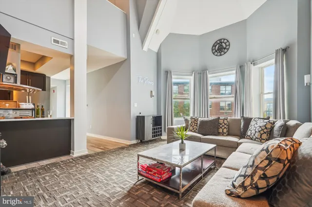 a living room with furniture and a couch