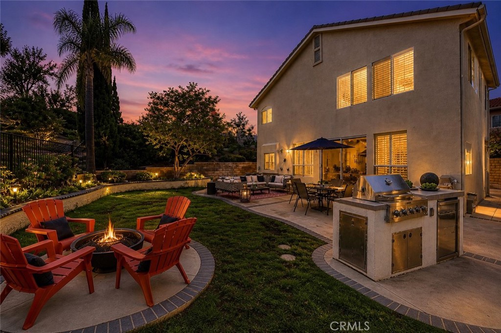 19901 Mid Pines Lane Porter Ranch, CA 91326 - Photo 12 of 23 Backyard Twilight (This picture has been digitally altered)