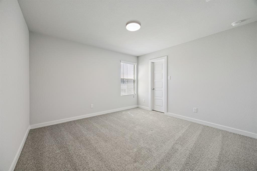 7624 Kingfisher Road Aubrey, TX 76227 - Photo 23 of 32 a view of an empty room