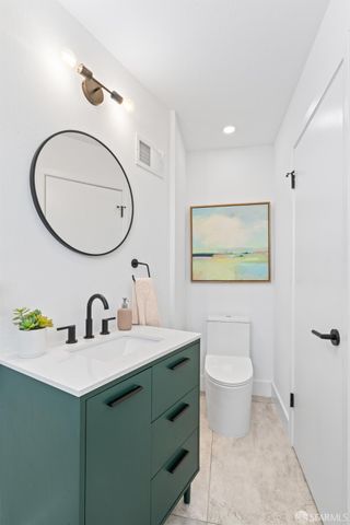 swimming pool view with a garden space