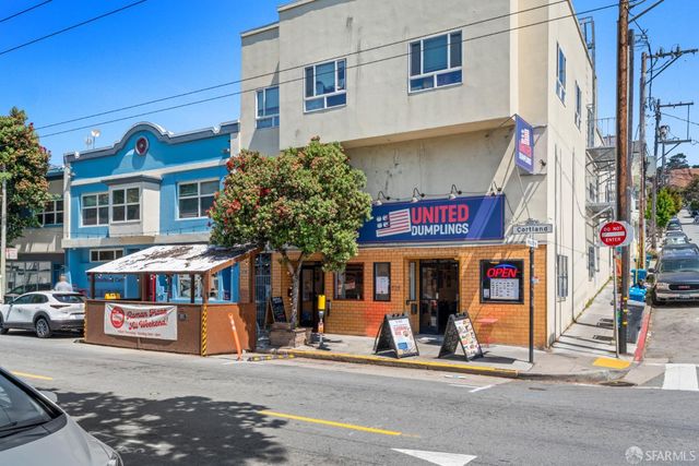 an aerial view of a city with lots of residential buildings