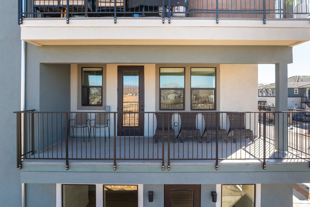 762 West Periwinkle Lane, Unit 102 St. George, UT 84790 - Photo 28 of 40 Back of property featuring a balcony and stucco siding