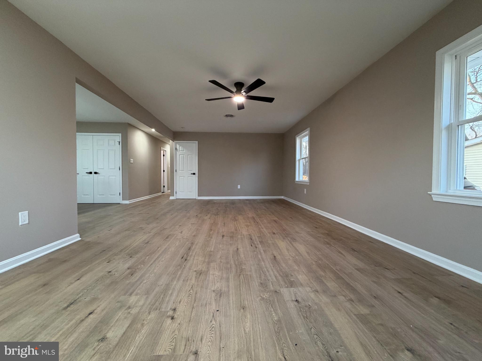 1906 Harbor Drive Chester, MD 21619 - Photo 18 of 44 wooden floor in an empty room with a window
