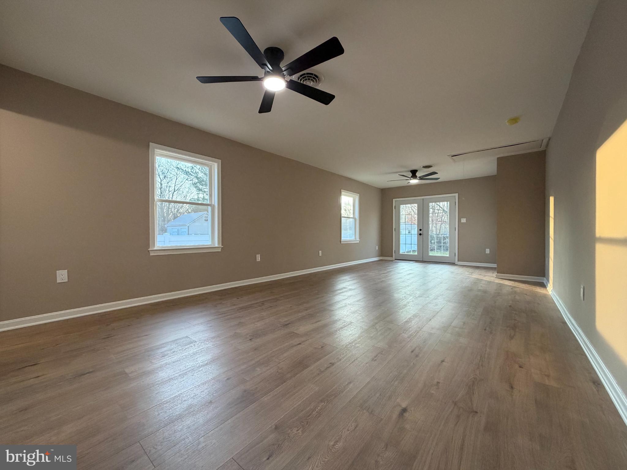 1906 Harbor Drive Chester, MD 21619 - Photo 28 of 44 a view of an empty room with wooden floor and a window