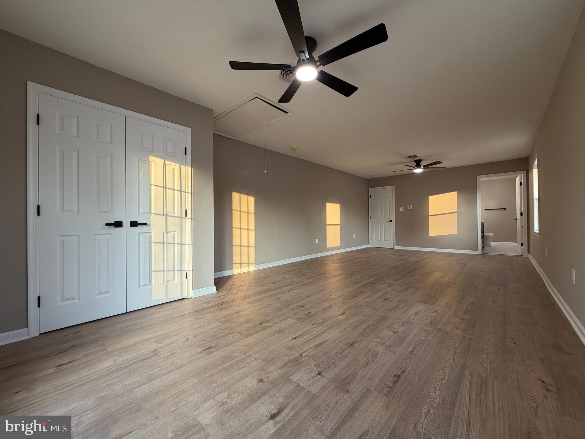 1906 Harbor Drive Chester, MD 21619 - Photo 29 of 44 a view of empty room with wooden floor and fan