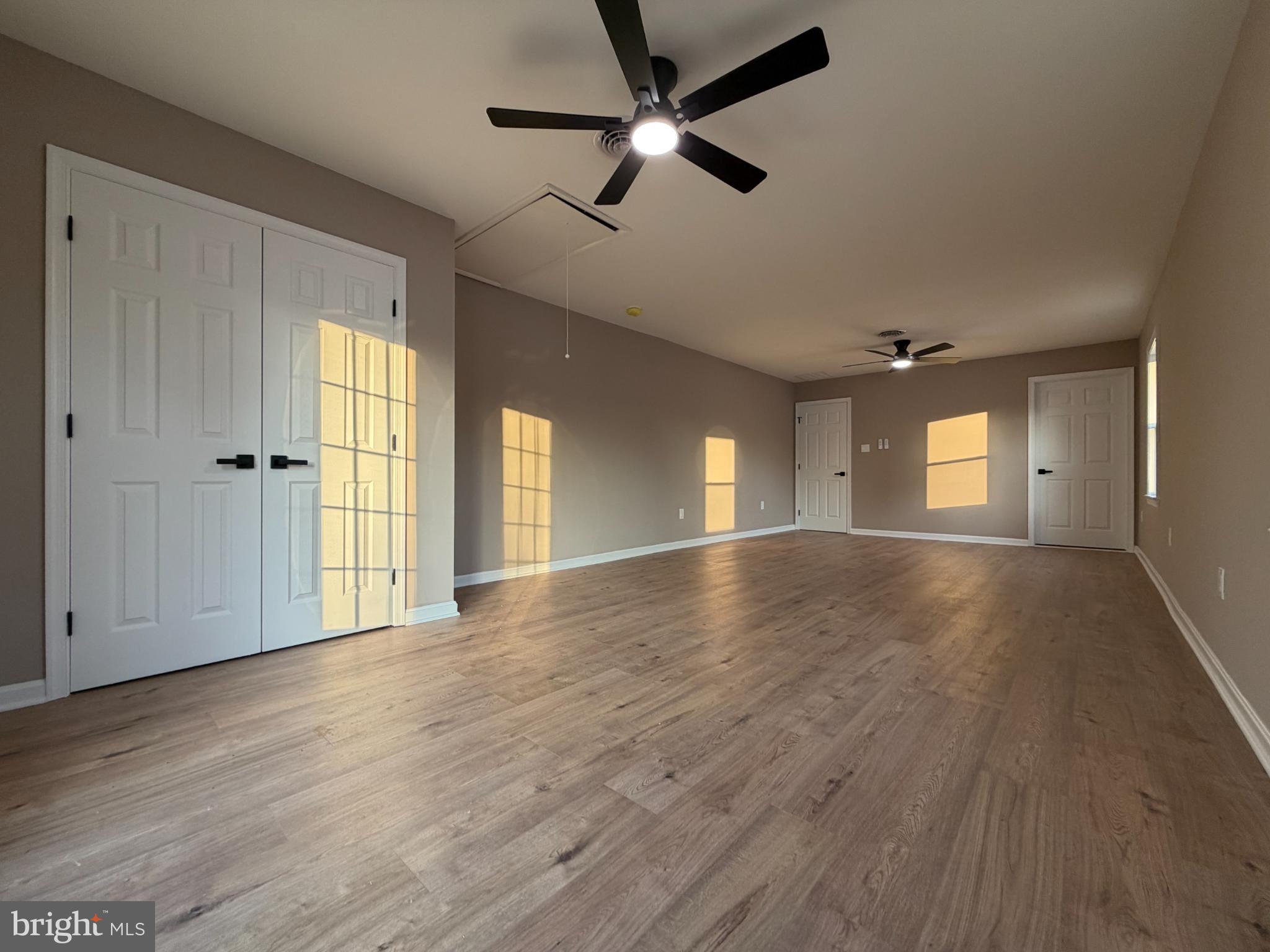 1906 Harbor Drive Chester, MD 21619 - Photo 30 of 44 a view of empty room with wooden floor and fan