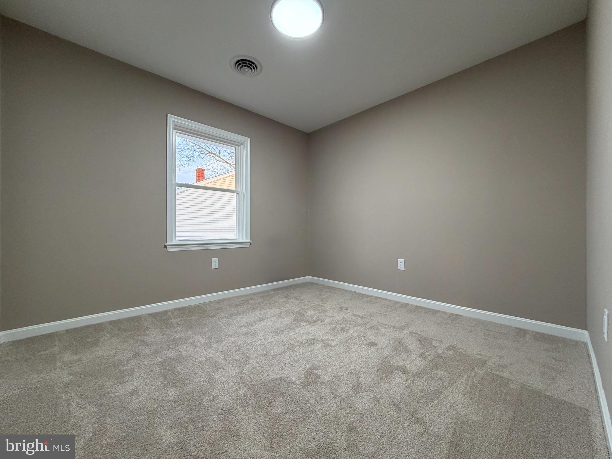 1906 Harbor Drive Chester, MD 21619 - Photo 37 of 44 an empty room with windows and closet