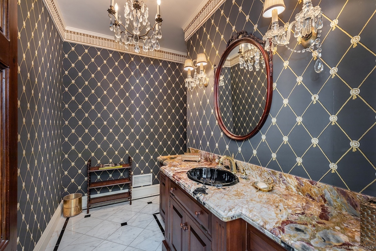 19 Seherr Thoss Drive Litchfield, CT 06759 - Photo 17 of 37 a kitchen with a stove a sink and a dining table