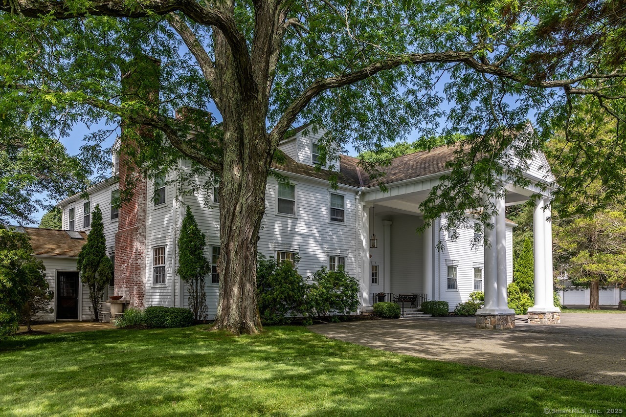 19 Seherr Thoss Drive Litchfield, CT 06759 - Photo 2 of 37 front view of a house with a yard