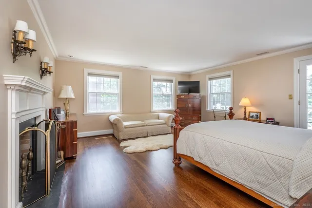 a bed room with bed and a couch