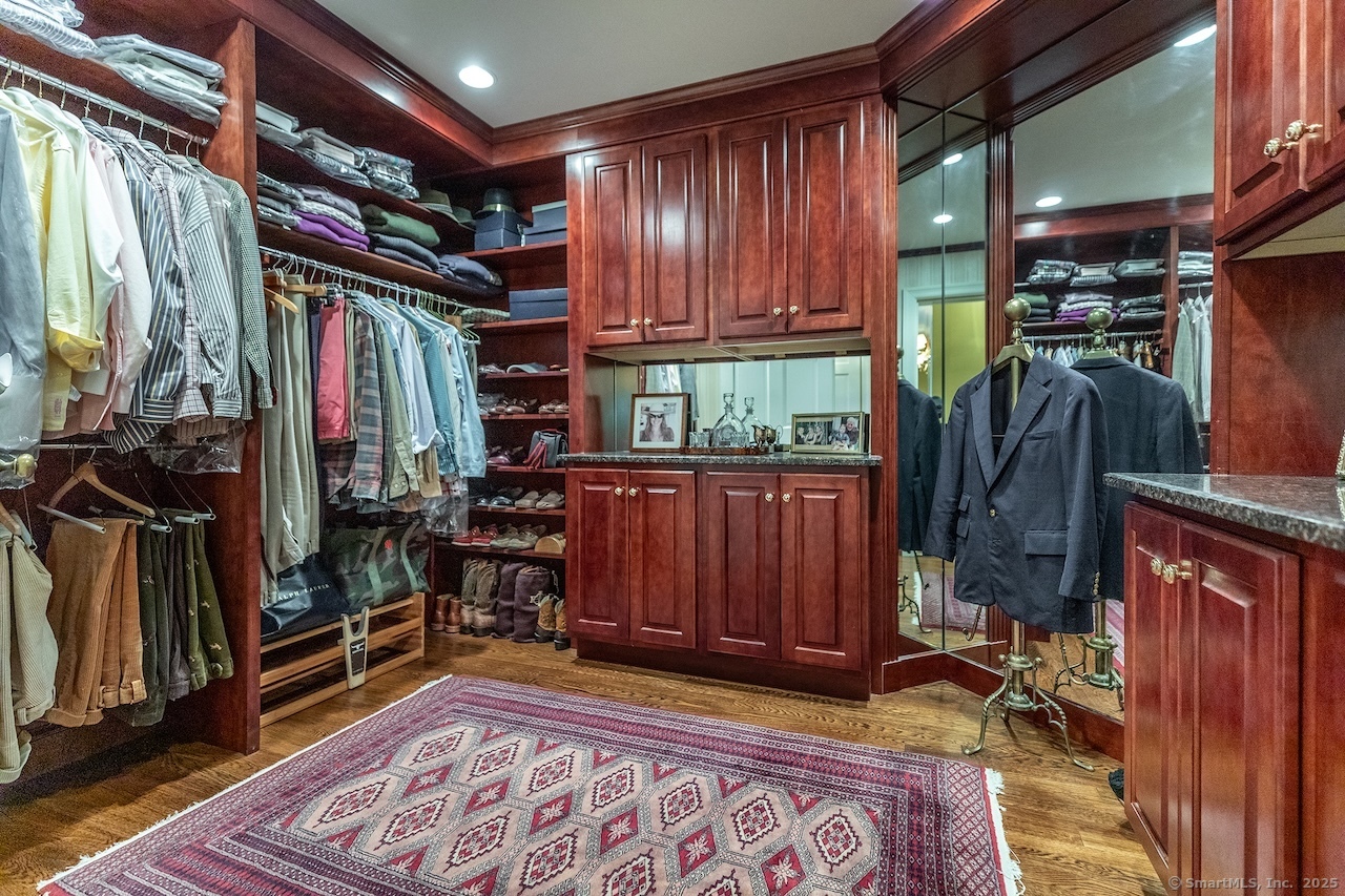 19 Seherr Thoss Drive Litchfield, CT 06759 - Photo 25 of 37 a view of walk in closet with clothes and shoes