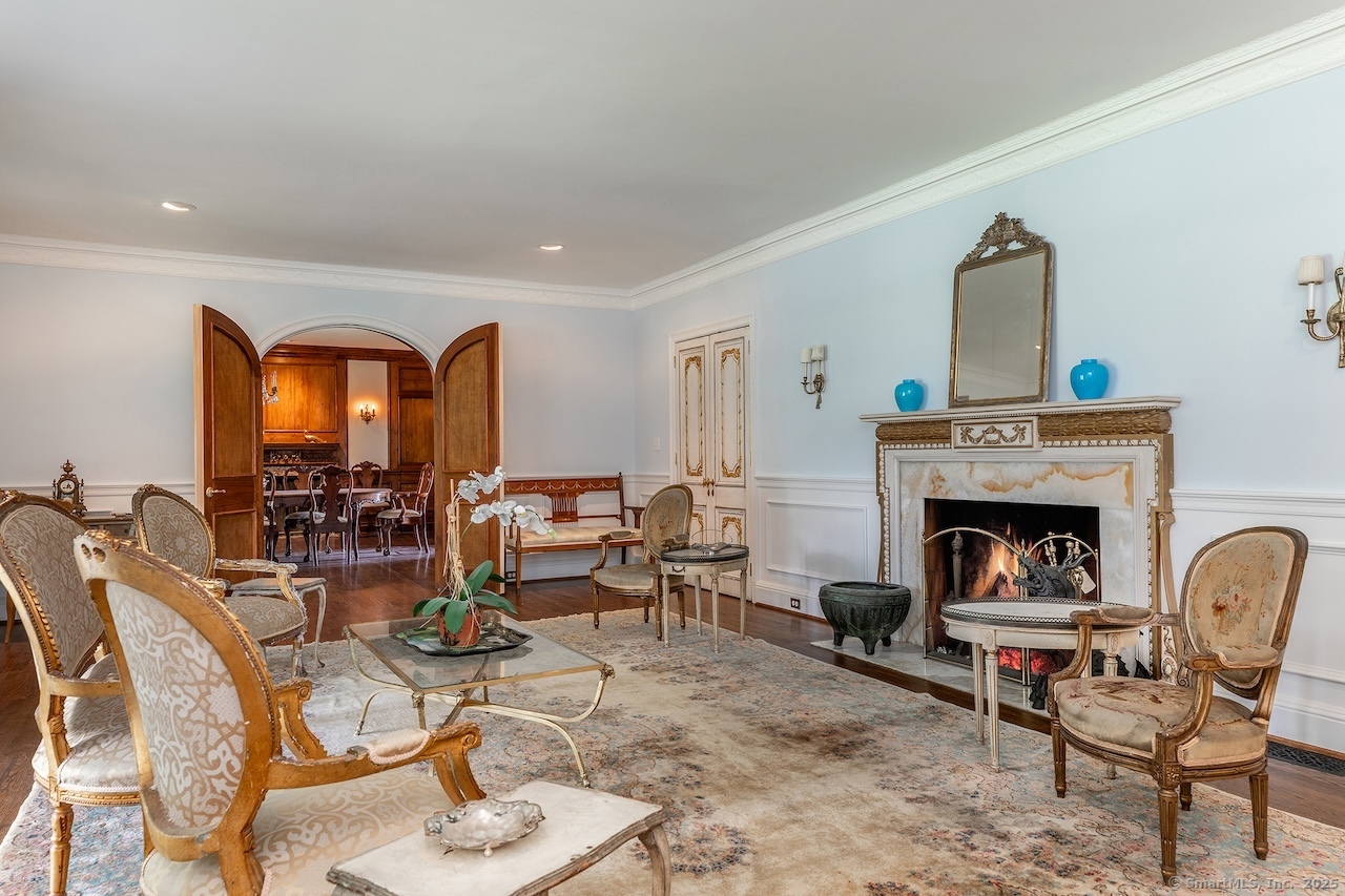 19 Seherr Thoss Drive Litchfield, CT 06759 - Photo 8 of 37 a living room with furniture and a fireplace