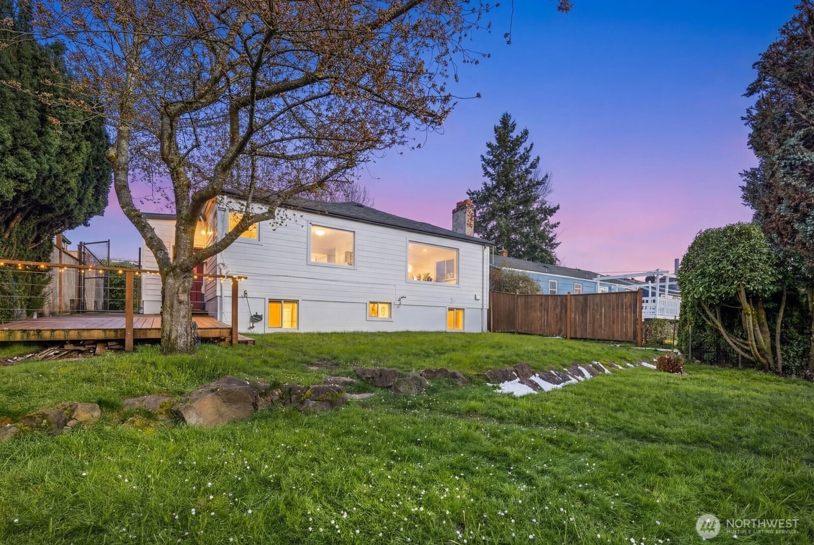 6023 35th Avenue Southwest Seattle, WA 98126 - Photo 2 of 38 a house view with a garden space