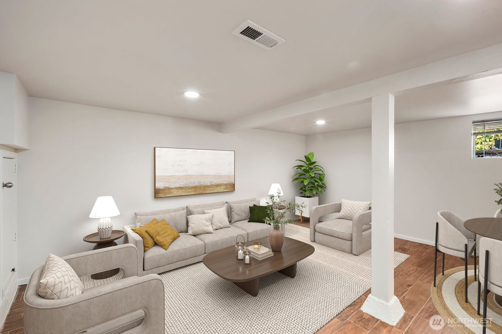 6023 35th Avenue Southwest Seattle, WA 98126 - Photo 29 of 38 a living room with furniture and a potted plant