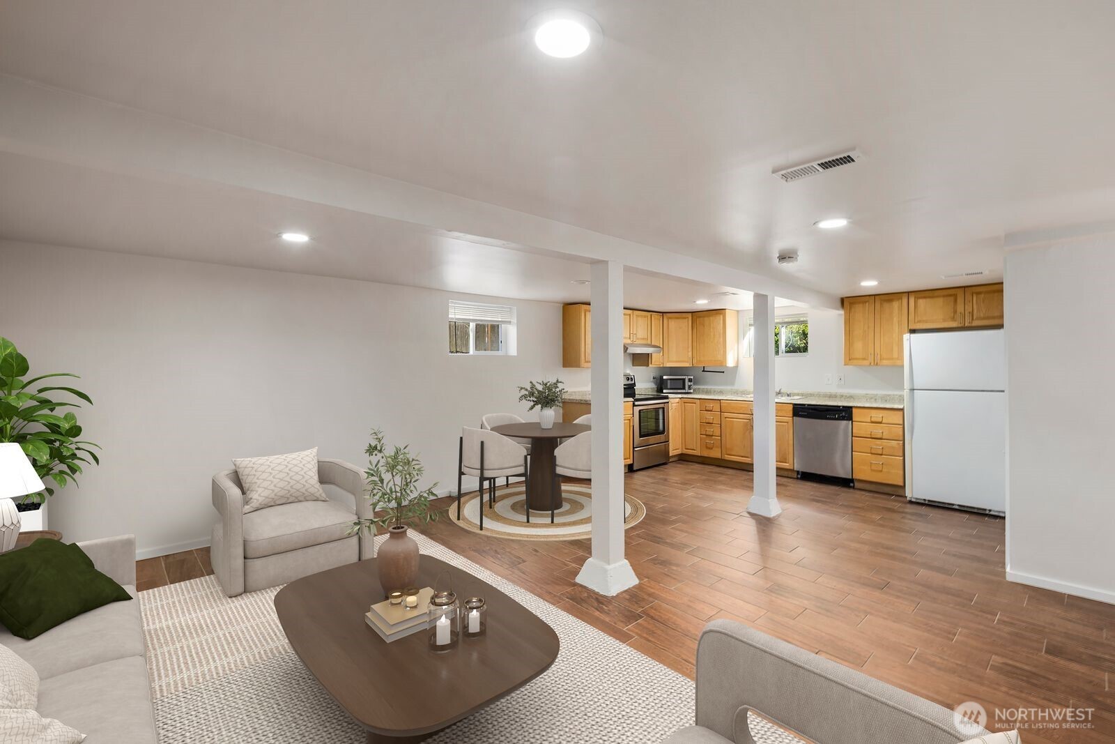 6023 35th Avenue Southwest Seattle, WA 98126 - Photo 30 of 38 a living room with furniture and a table