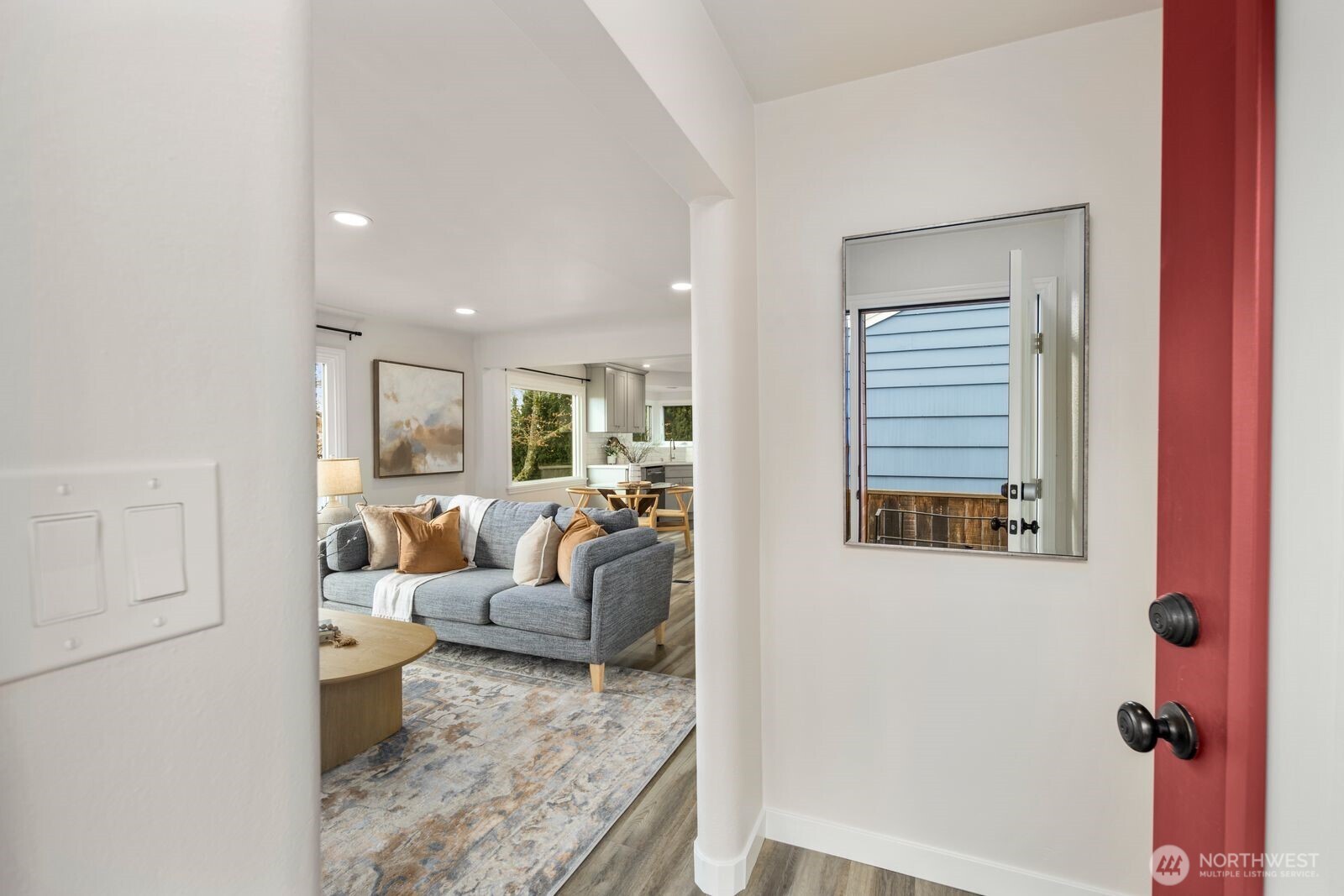6023 35th Avenue Southwest Seattle, WA 98126 - Photo 3 of 38 a living room with furniture and a window