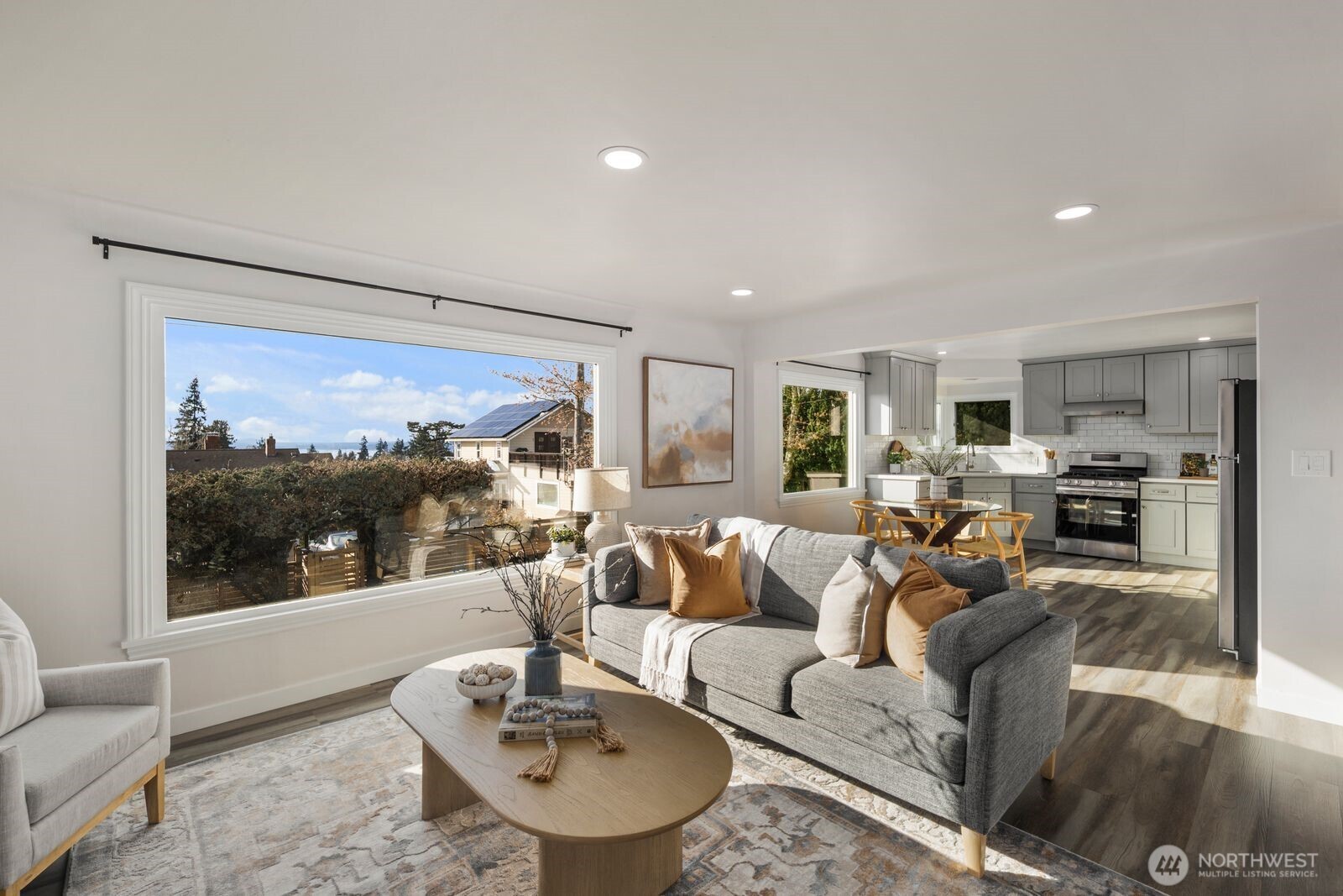 6023 35th Avenue Southwest Seattle, WA 98126 - Photo 4 of 38 a living room with furniture and a large window