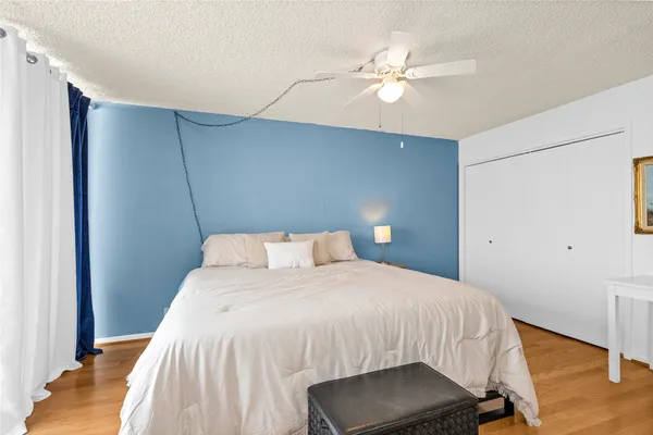 a view of a balcony with furniture