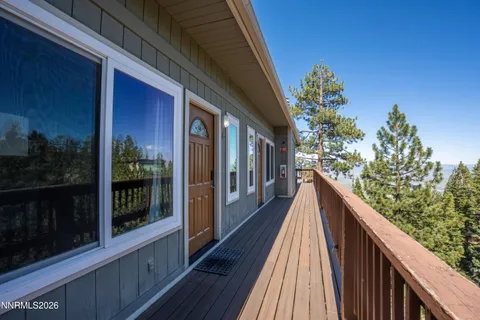 a view of balcony with furniture