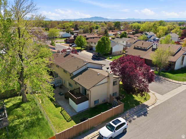 2632 North 140 West Sunset, UT 84015 - Photo 11 of 12 Aerial view of residential area with a mountain backdrop